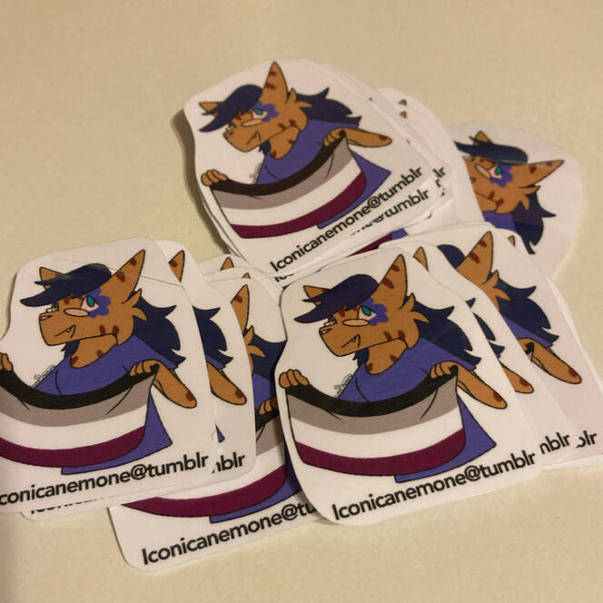 A pile of stickers exhibiting one character
